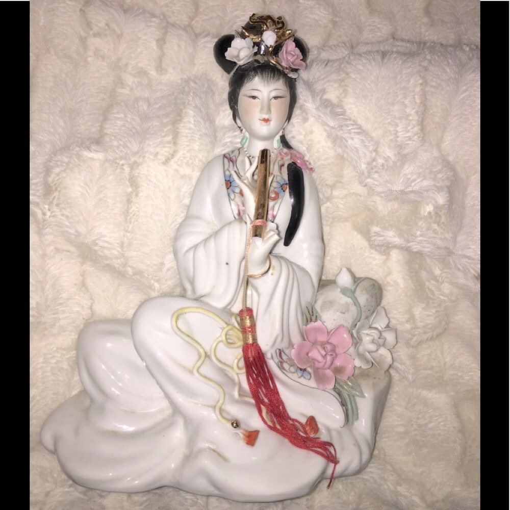 Porcelain Geisha Playing Flute